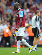 Carlton Cole of West Ham United looks dejected during the Premier League match between West Ham and Blackburn Rovers at Upton Park on May 7, 2011 in London, England