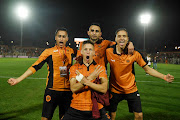 RS Berkane players celebrate victory during the Caf Confederation Cup semifinal second leg match against TP Mazembe at the Municipal de Berkane Stadium in Berkane, Morocco on May 15 2022.