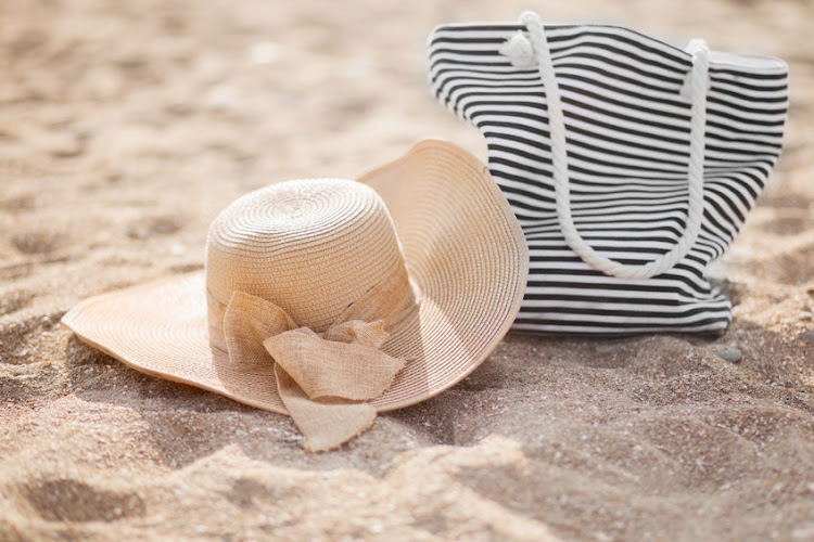 Sunscreen is a must for your beach bag, but don't forget to pop some other beauty products in there too.