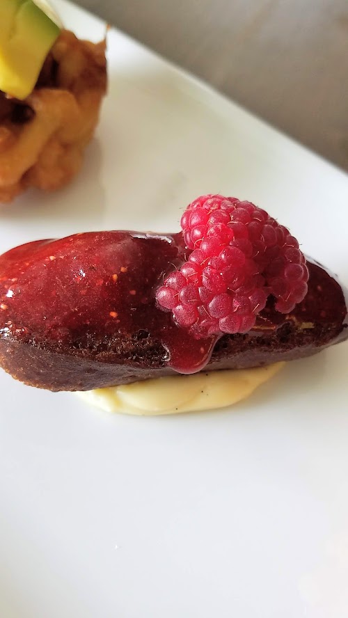 strawberry glazed graham cracker bar with cream cheese custard, raspberries and prosecco drizzle donut from my first look at Outer Darkness Donuts, which on offer here only on Sundays are dark roast drip coffees, fun mimosas, loose leaf tea, and only one food dish you can order: a flight of mini-donuts.