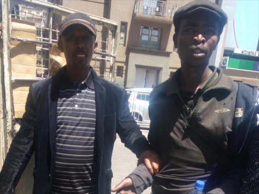 City Inspectorate official arrest a mugger in Nairobi, Sunday January 21, 2018. /FILE