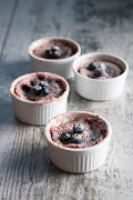 Berry and white chocolate microwave puddings.