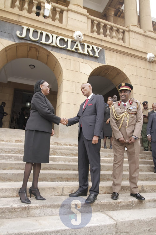 Chief Justice Martha Koome commends Directorate of Criminal Investigation boss Amin Mohammed for oath of office taking on October 19, 2022.