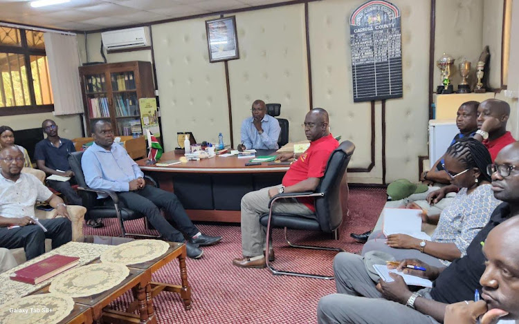 Garissa county commissioner Mohamed Mwabudzo when he met with officials from LAPSSET in his office.