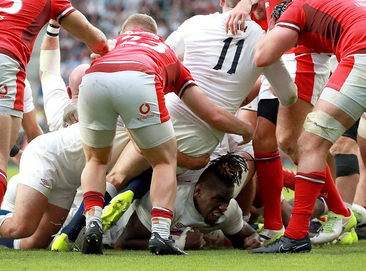 Maro Itoje scores England's first try in their Rugby World Cup warm-up match agaainst Wales at Twickenham in London on August 12 2023.