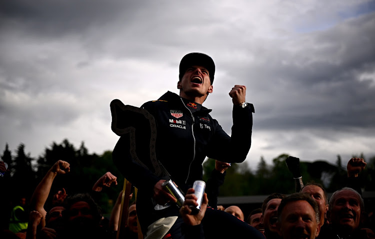 Race winner Max Verstappen of the Netherlands celebrates with his team after the F1 Grand Prix in Imola,Italy, April 24 2022. Picture: CLIVE MASON/GETTY IMAGES