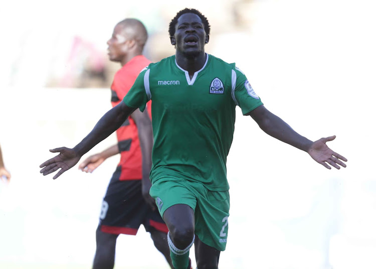 Gor Mahia's Lawrence Juma celebrates after scoring the fourth goal