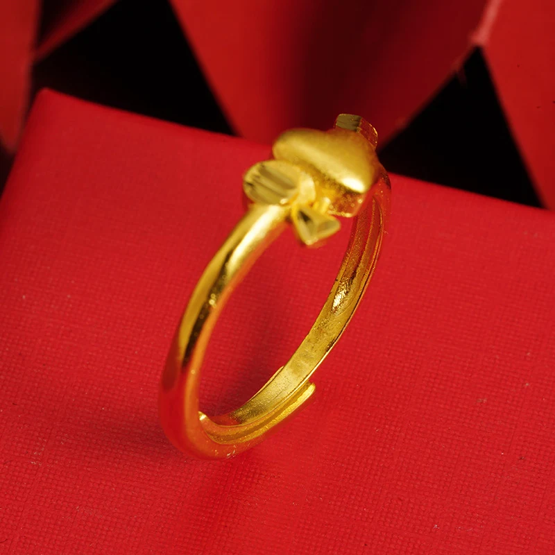 Anillo de corazón de amor de oro aluvial, aleación de cobre. Diseño único con una flecha para llevar, ideal para regalo.