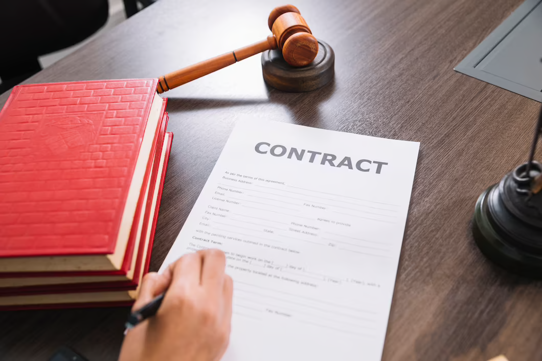 Securing a Training Contract with legal documents and gavel on a table.