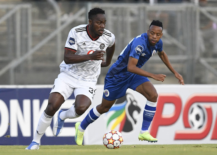 Bienvenu Eva Nga of Orlando Pirates is challenged by Selaelo Rasebotja of Supersport United in the DStv Premiership match at Lucas Moripe Stadium on August 21 2022.