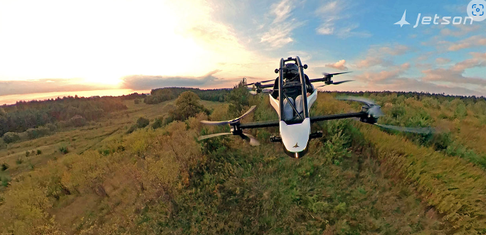 A helicopter flying over a field

Description automatically generated with medium confidence