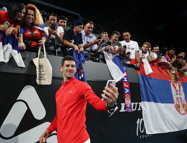 Novak Djokovic celebrates with fans after beating Sebastian Korda to win the Adelaide International, January 8 2023. Picture: SARAH REED/GETTY IMAGES