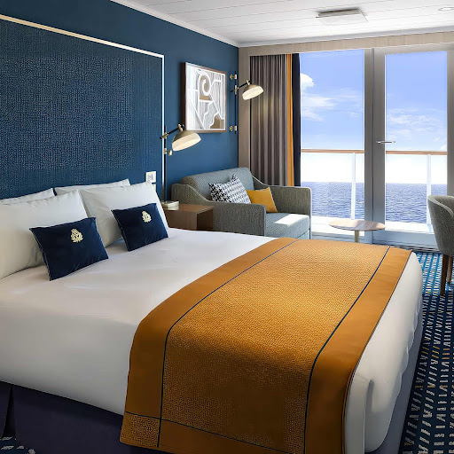 Britannia_Club_Balcony_stateroom.jpg - Take in prime sea views from your own private balcony when staying in a Britannia Club stateroom.