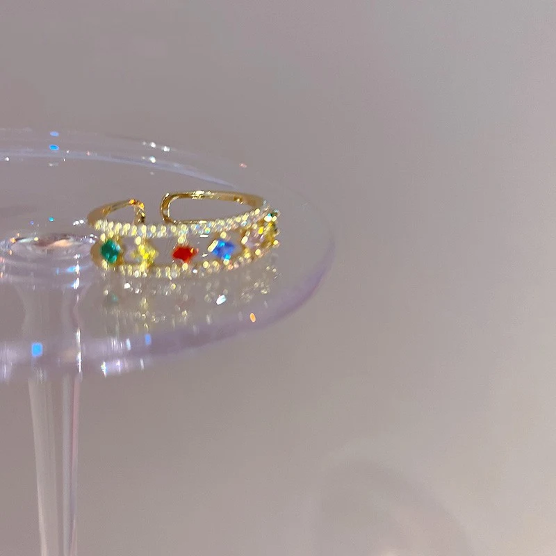 Small And Luxurious Colored Gemstone Ring. Elegant jewelry piece featuring colorful gemstones for a touch of sophisticat
