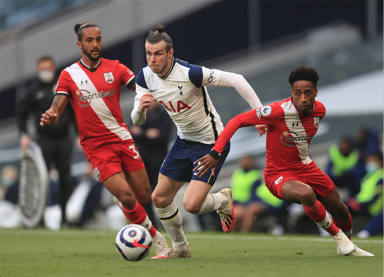 Tottenham Hotspur's Gareth Bale in action with Southampton's Kyle Walker-Peters and Theo Walcott