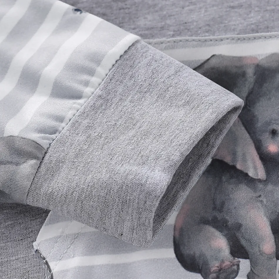 Macacão infantil modelo explosão de elefante com capuz, roupa de bebê fofa e quentinha, ideal para brincar e dormir.
