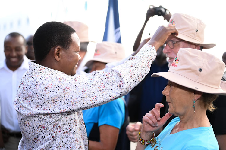 Tourism CS Alfred Mutua interacts with tourists after the cruise ship docked in Mombasa on February 2, 2024