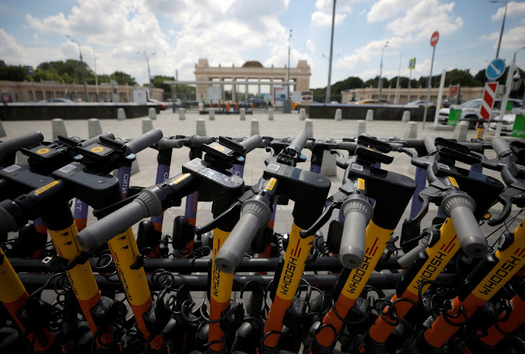 Electric scooters are parked at a station in Moscow on June 8 2021. File Picture: REUTERS/MAXIM SHEMETOV