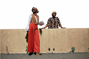 Ikram Yussuf models a pantsuit by Joburg designer Faida Chikwatu.