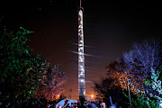 An incredible 20m tower of light, inspired by artist R1 and his friend Isaac, and made from plastic bottles collected by informal waste collectors beams over Johannesburg's inner city suburb of Troyeville.