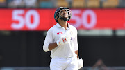 Shardul Thakur celebrates his half century during day three of the fourth test match between Australia and India at the Gabba in Brisbane, Australia, on January 17, 2021. 