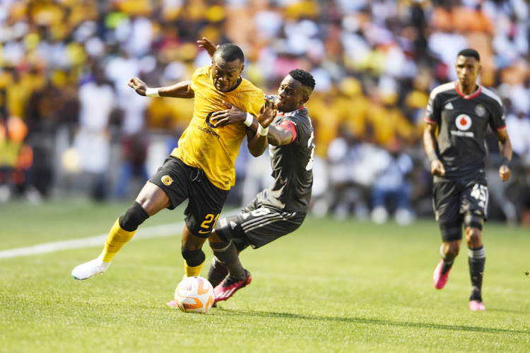 Christian Saile of Kaizer Chiefs and Innocent Maela of Orlando Pirates during the DStv Premiership match between Kaizer Chiefs and Orlando Pirates at FNB Stadium on February 25, 2023 in Johannesburg, South Africa.