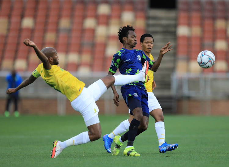 Mpho Mvelase of Marumo Gallants and Mosa Lebusa of Mamelodi Sundowns FC challenge for possession during the DStv Premiership 2020/21 match between Marumo Gallants and Mamelodi Sundowns.