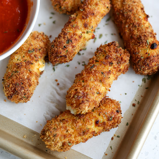 Easy Panko breaded Air Fryer Mozzarella Sticks cooked up crispy in the air fryer. Just as delicious as deep fried without the mess and added calories. 