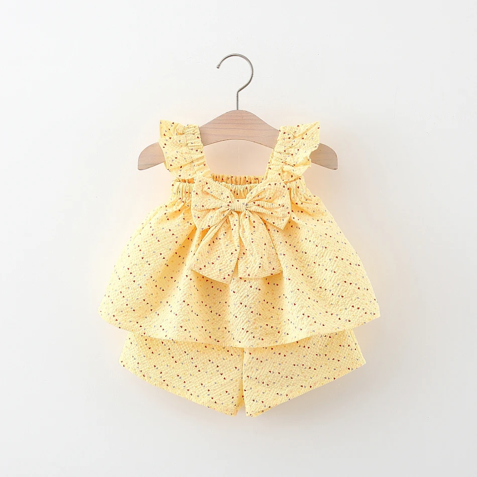 Flying sleeve length bowknot dress shorts two-piece set. Perfect for a stylish and comfortable look. Enjoy the ease of a