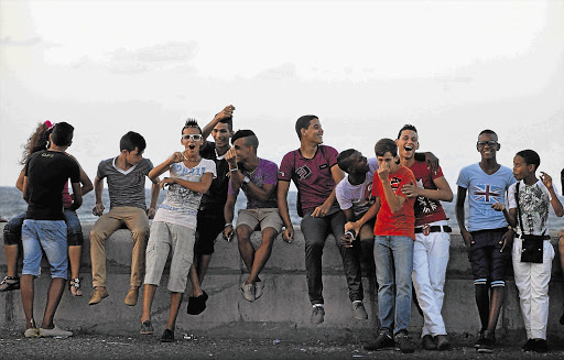 Havana's seafront El Malecon Boulevard is a meeting place for Cuba's young, many of whom despair of being able to attain the lifestyle they aspire to in a moribund statist economy