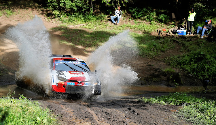 Finland's Kalle Rovanpera with navigator Jonne Halttunen of Toyota Gazoo team power their Toyota GR Yaris through a river at the Soysambu competitive section during the World Rally Championship in Naivasha. June 25, 2022. Jack Owuor