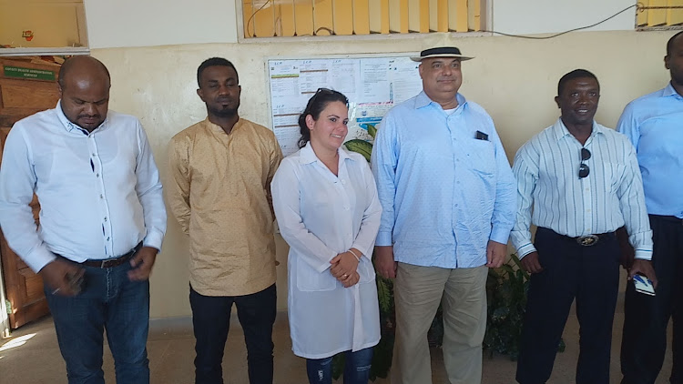 Cuban medic Dr Liliana Casos (third left) and with Lamu Governor Fahim Twaha and county officials in 2018.