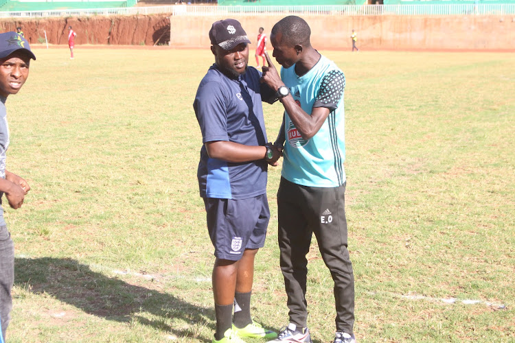 Gusii FC coach Kassim Junior with his Kibera Black Stars counterpart Evans Omondi at Gusii Stadium