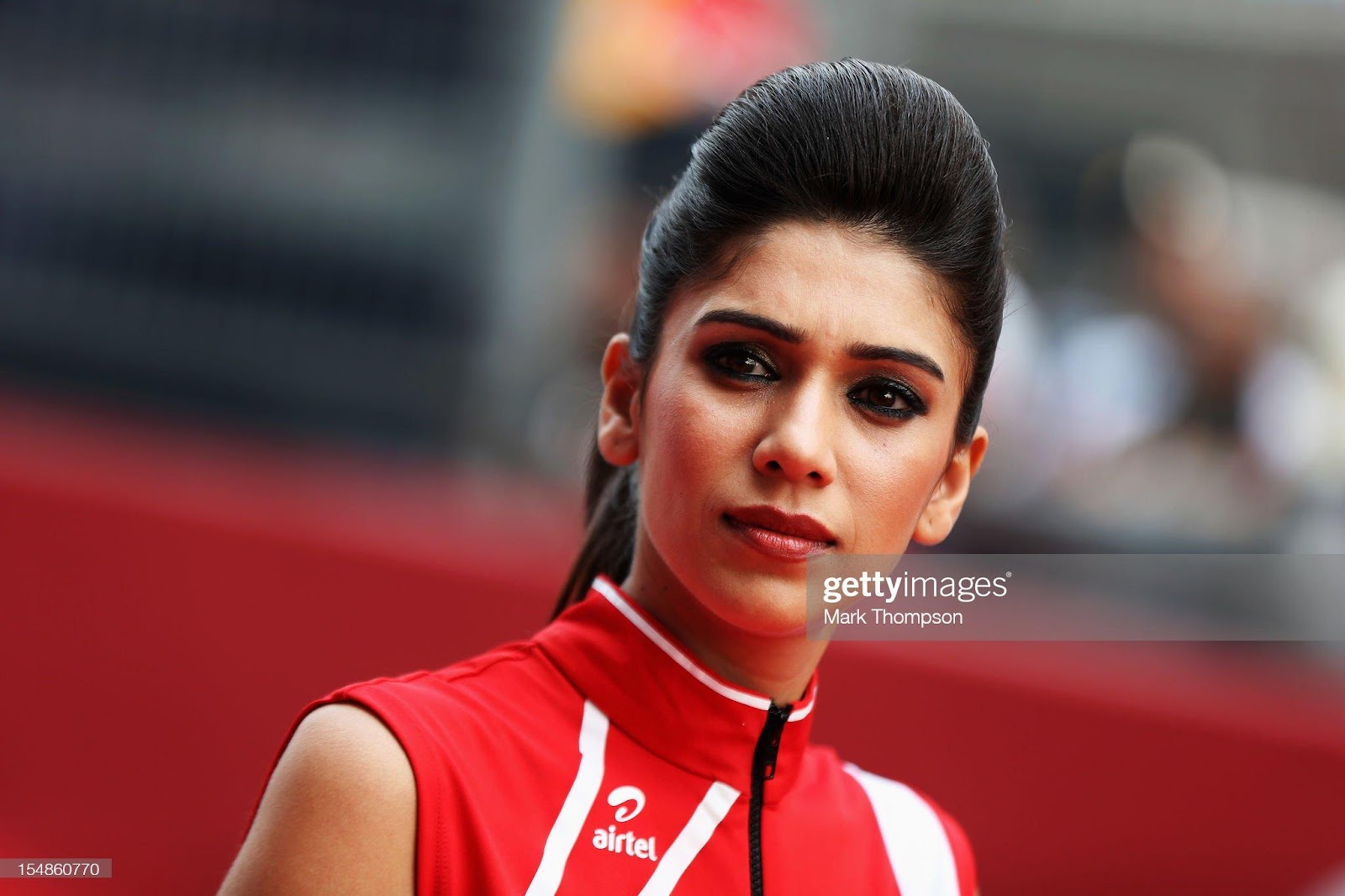 D:\Documenti\posts\posts\Women and motorsport\foto\Getty e altre\grid-girl-is-seen-at-the-drivers-parade-before-the-indian-formula-one-picture-id154860770.jpg