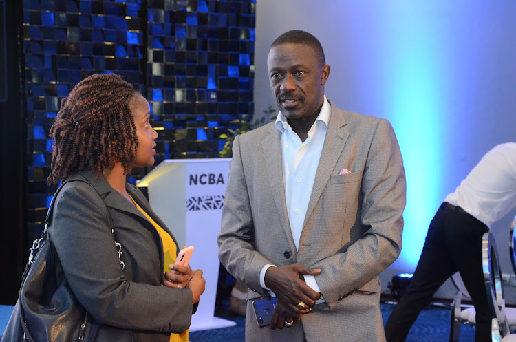 NCBA group marketing director Roseline Gichuru and Redhouse PR MD Okoth Obado