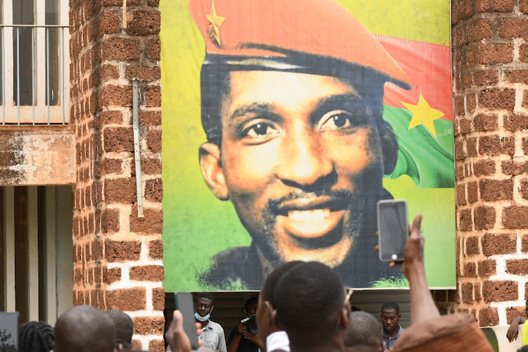 Supporters of former president Thomas Sankara gather at a memorial site after a court in jailed former president Blaise Compaore to life imprisonment for plotting his murder, in Ouagadougou, Burkina Faso, April 6 2022. Picture: ANNE MIMAULT/ REUTERS