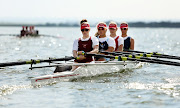 The St Mary's open team training on the Bronkhorst dam.  From left:  Amy Hancock, Tayla-May Bentley, Megan-Leigh Magnussen, Georgi Sabio.