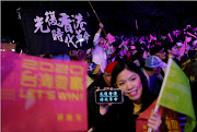 Hong Kong anti-government protesters attend a rally in support of Taiwan President Tsai Ing-wen outside the Democratic Progressive Party (DPP) headquarters in Taipei, Taiwan, on January 11 2020. 
