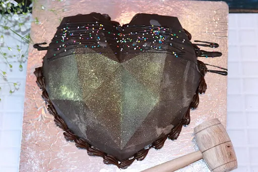 Dark Pinata Heart Cake