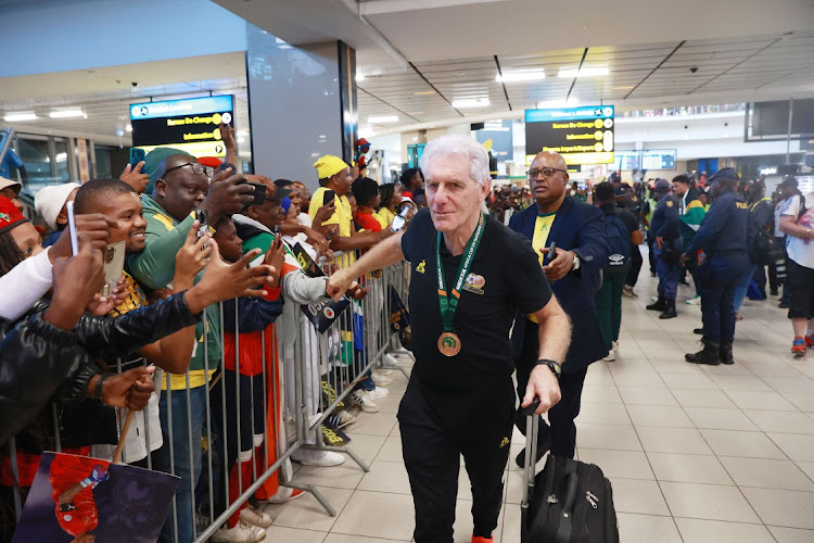 Bafana Bafana coach Hugo Broos during the national football team arrival at OR Tambo Airport in Johannesburg.