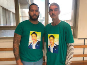 Curt Desplaces, left, and Leyton Fynn's father Tyrone during Dondre Addison's court appearance on Friday.