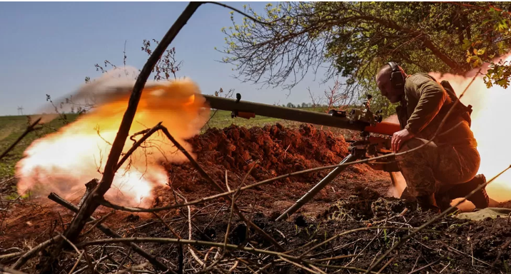 A Ukrainian soldier firing an anti-tank grenade launcher at a front line near Bakhmut (pictured on 3 May)