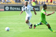 Riyaad Norodien (L) of Orlando Pirates during the Absa Premiership match against at Royal Bafokeng Stadium on January 27, 2018 in Rustenburg, South Africa. 