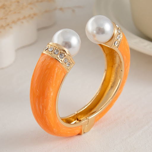 Title 10, Fashion Dopamine Pearl Spring Bracelet. Elevate...