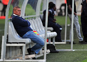 AmaZulu coach Cavin Johnson cuts a disheartened figure as he remained on his bench even after the final whistle during his team's 3-1 Telkom Knockout quarterfinal defeat against Orlando Pirates at Moses Mabhida Stadium in Durban on November 3, 2018.
