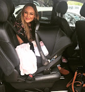 Karlien and baby Elah en route home.