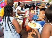 People eat kotas during the Kota Festival at the Soweto Theatre on September 16 2017. File Photo.