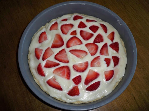 This is a variation of the strawberry pizza, made without the strawberry glaze, and in a 9 inch pan. However, the result is generally the same. 