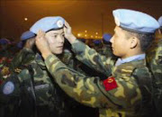 THREATENED: Chinese People's Liberation Army soldiers. Pic. China Daily. 23/11/07. © Reuters.