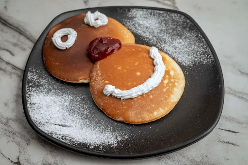 Pancake With Blueberry And Whipped Cream